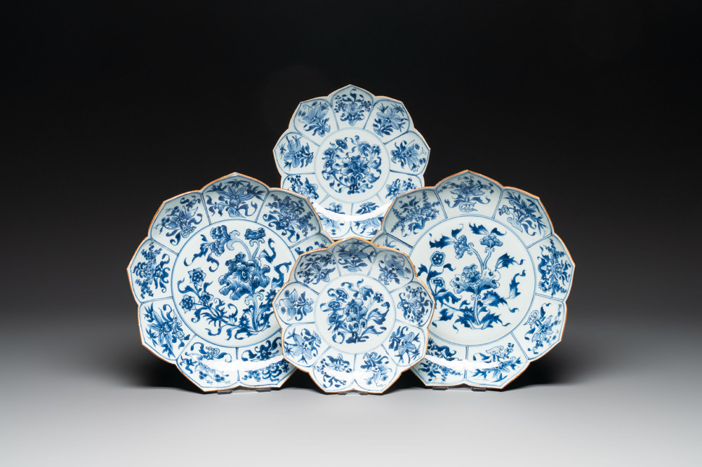 A pair of Chinese blue and white 'lotus' dishes and a pair of plates, Kangxi/Yongzheng