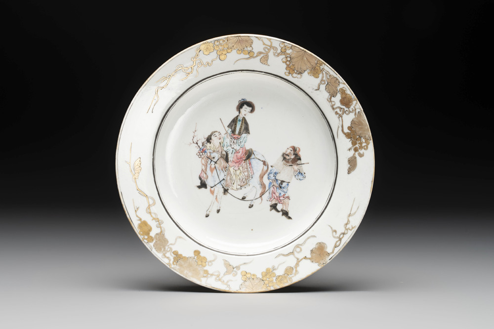 A Chinese famille rose semi-eggshell plate with a lady on horseback and attendants, Yongzheng