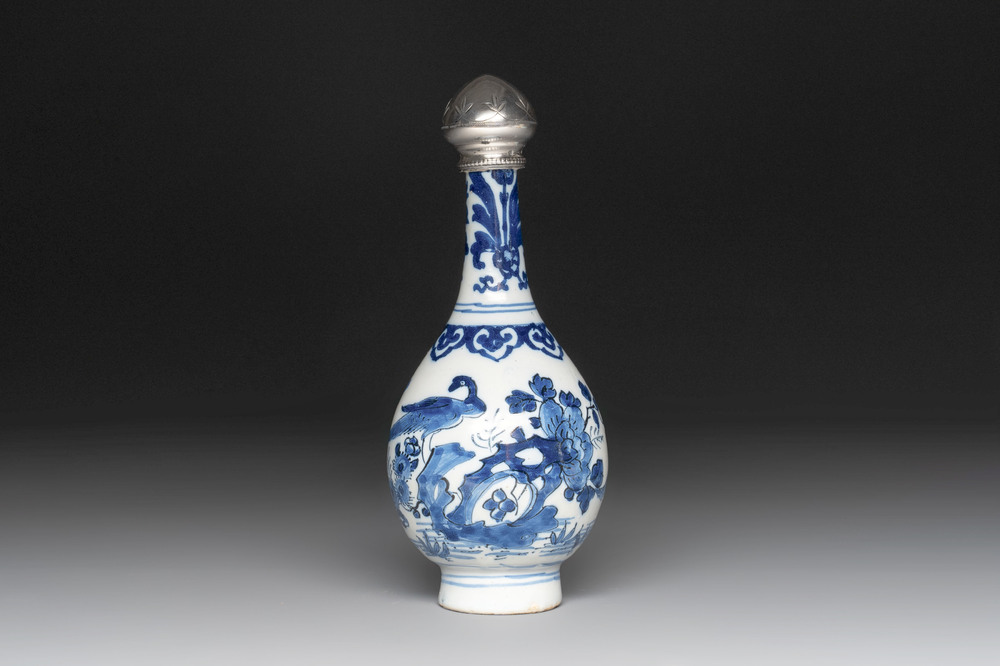 A blue and white Dutch Delft vase with silver cover, 18th C.