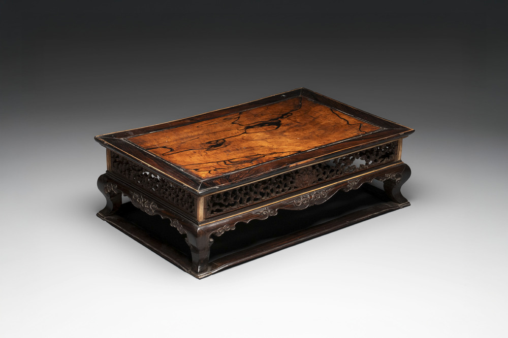 A finely carved Chinese hardwood stand, Qing
