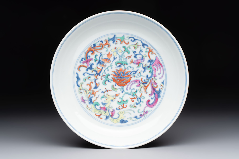 A Chinese doucai plate with floral design, Qianlong mark, 20th C.