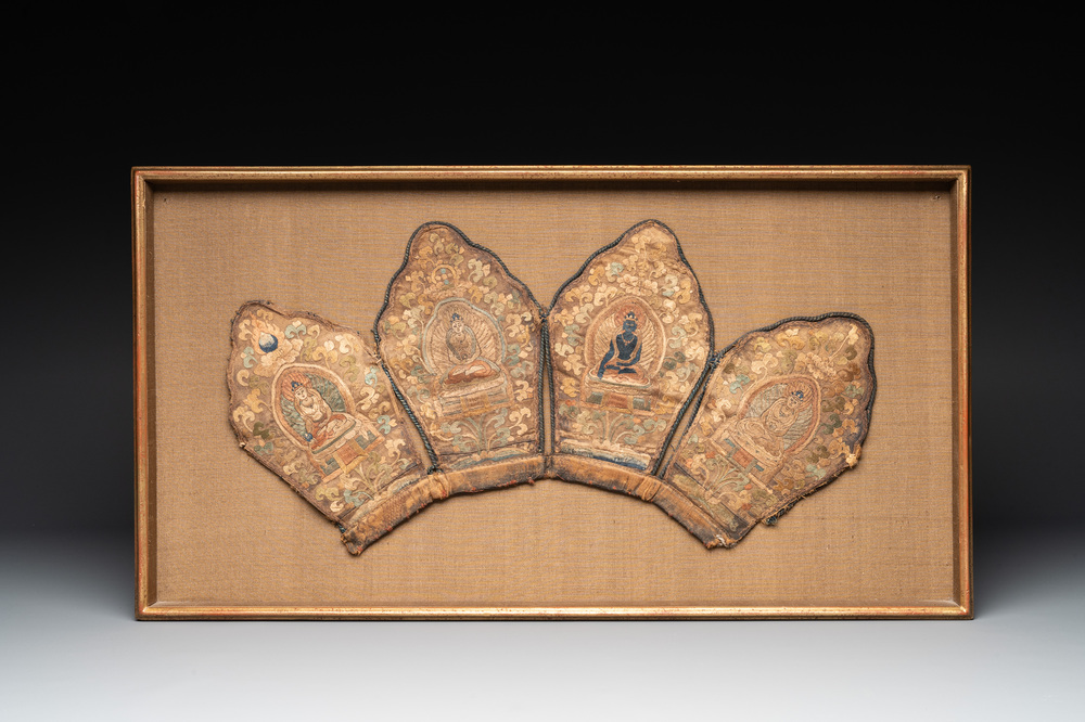 A framed Tibetan silk-embroidered four-leaf ritual crown with Transcendent Buddhas, Tibet, 18th C.