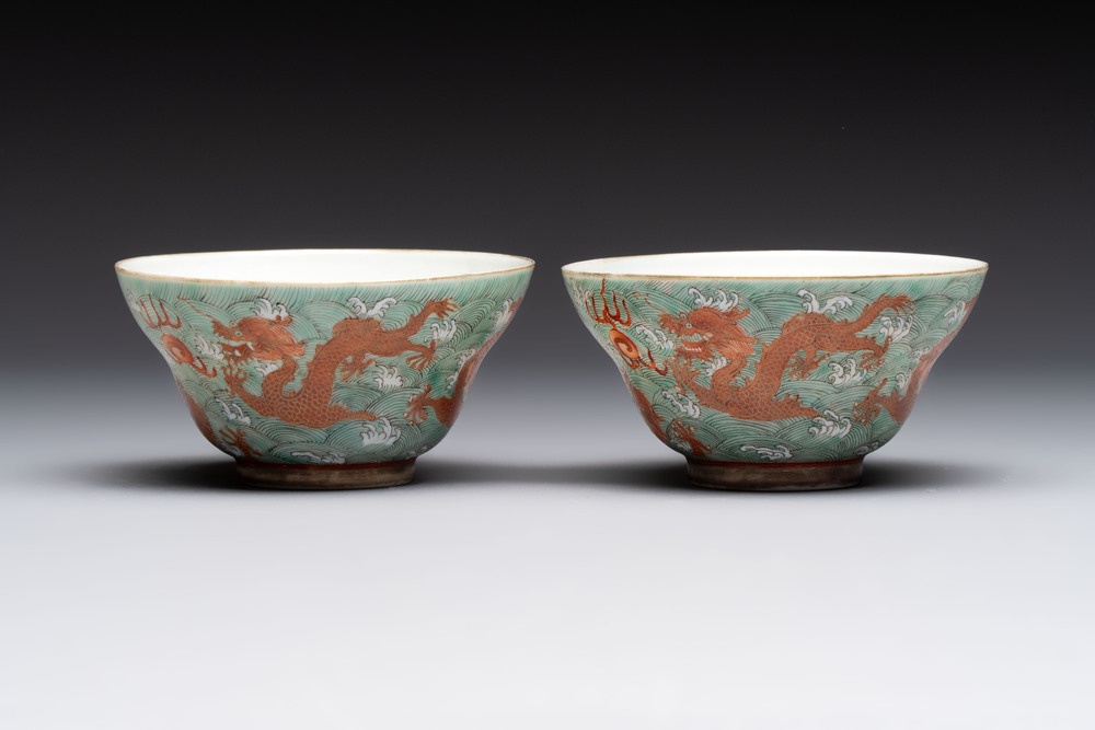 A pair of Chinese gilt and iron-red decorated 'dragons on waves' bowls, Jiaqing mark, 19th C.