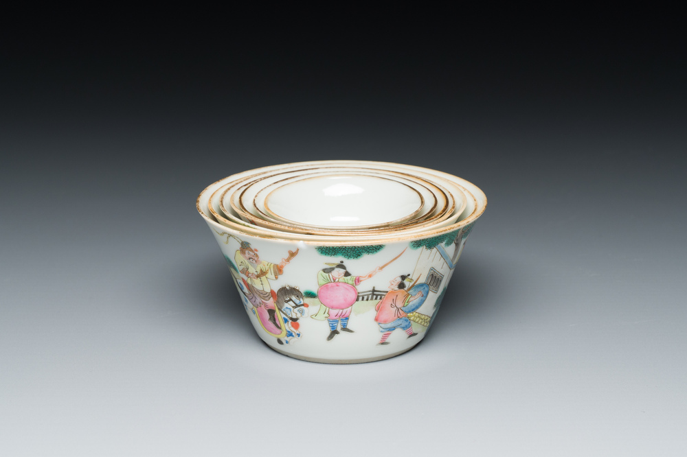A set of seven Chinese famille rose nesting bowls with narrative design, Daoguang
