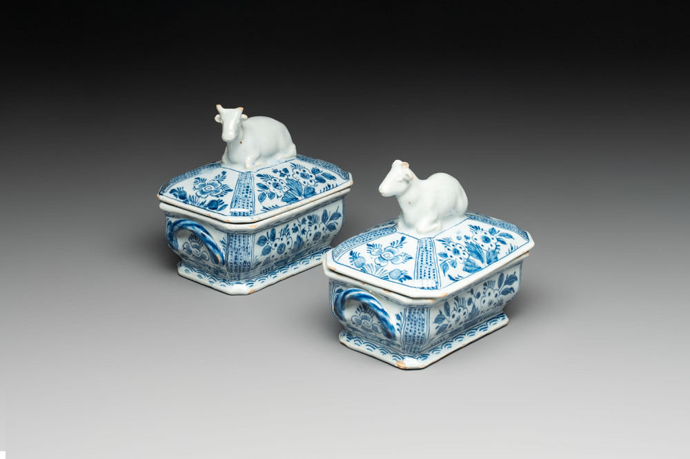 A pair of blue and white Dutch Delft cow-topped butter tubs and covers, 18th C.