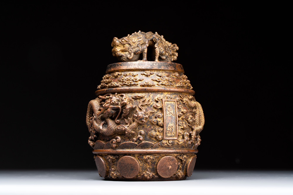 A fine Chinese gilt-bronze 'dragon among clouds' bell, Qianlong mark and of the period, dated 1743