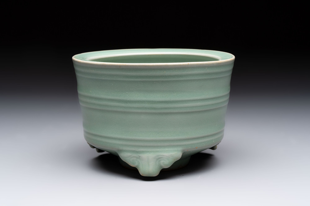 A Chinese Longquan celadon cylindrical tripod censer with &lsquo;trigrams&rsquo; design, Yuan/Ming