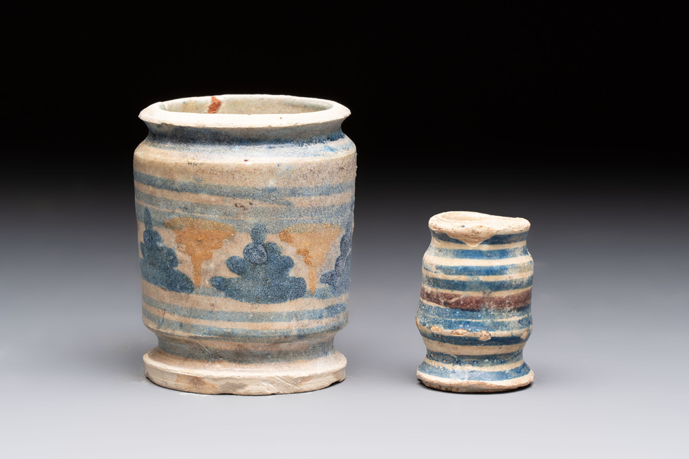 Two polychrome maiolica albarello-shaped ointment jars, Antwerp or Northern Netherlands, late 16th C.