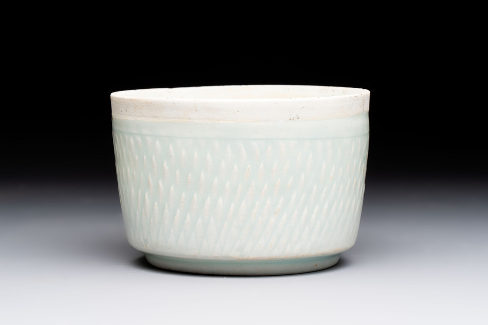 A Chinese qingbai bowl with castor relief design, Song