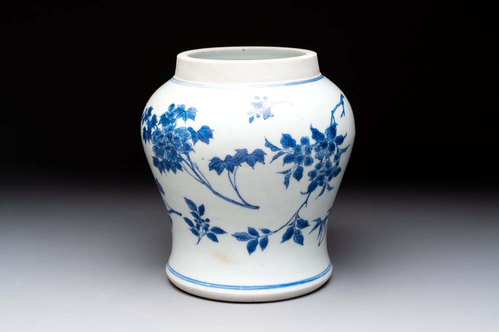 A Chinese blue and white vase with floral design, Transitional period