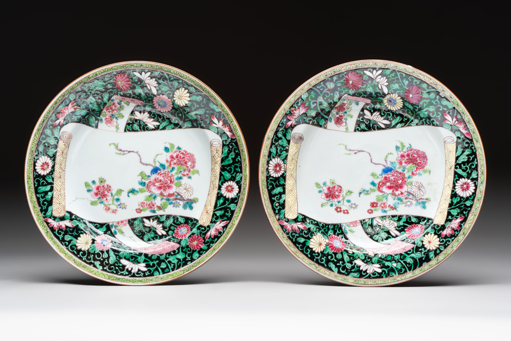 A pair of fine Chinese famille rose black-ground 'scrolls and flowers' plates, Yongzheng/Qianlong