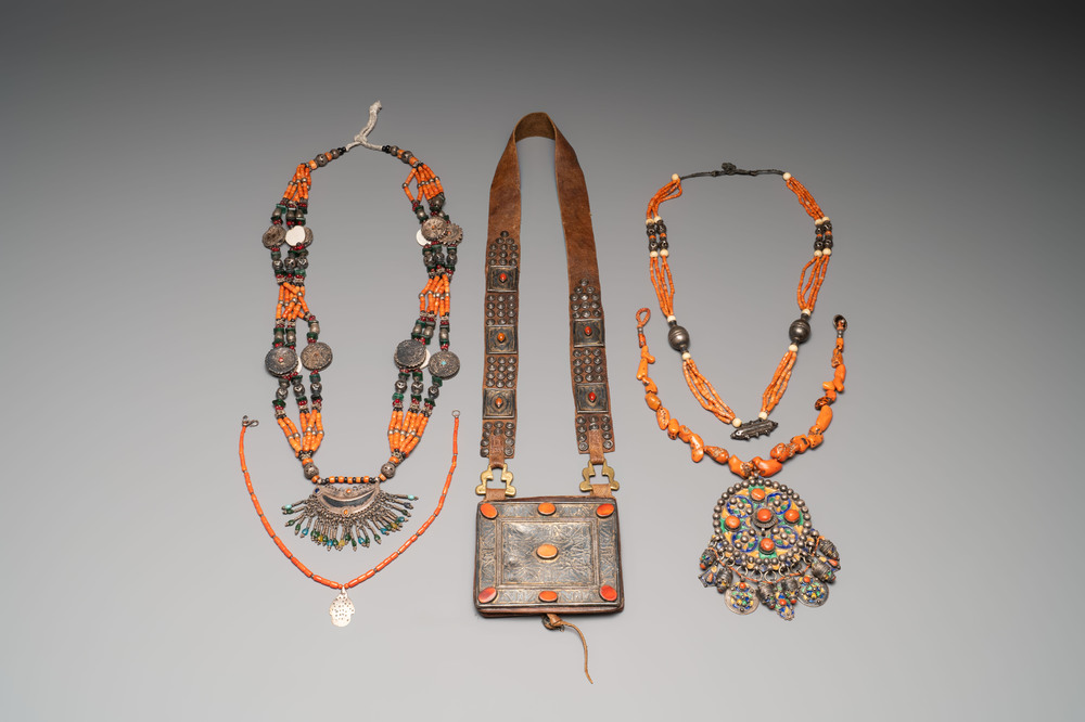 A varied group of four Islamic necklaces and a Koran holder, 19th C.