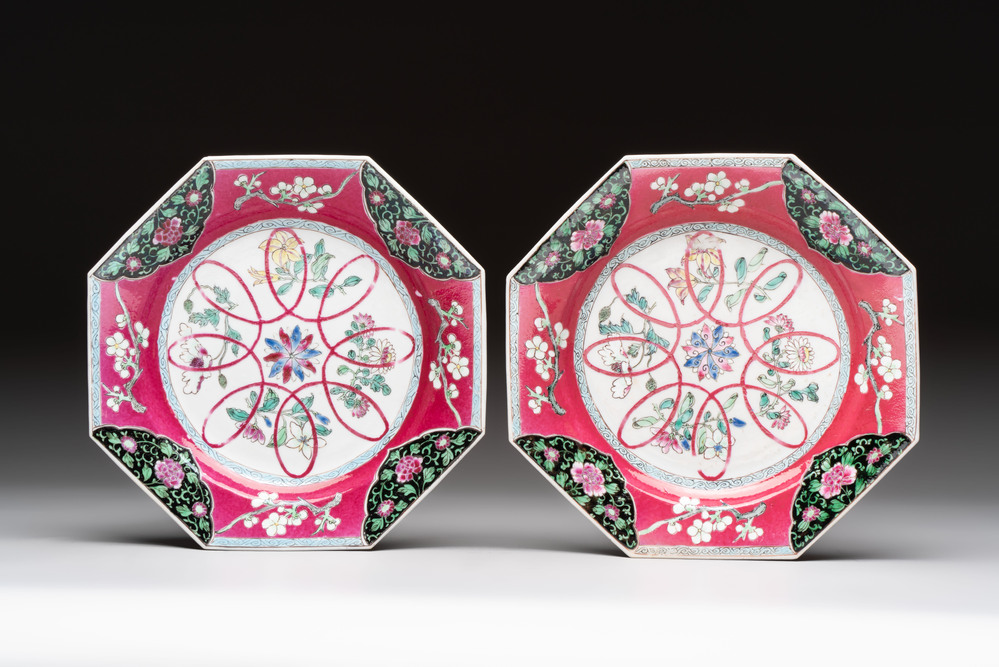 A pair of Chinese famille rose ruby-ground octagonal plates with floral design, Yongzheng