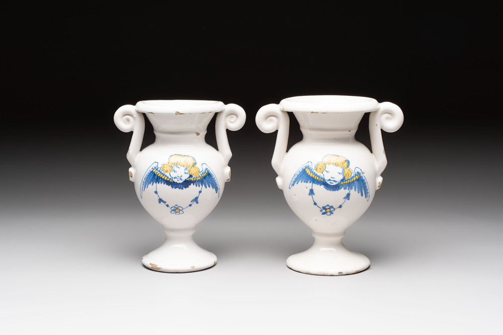 A pair of blue, white and yellow Dutch Delft altar vases, late 17th C.