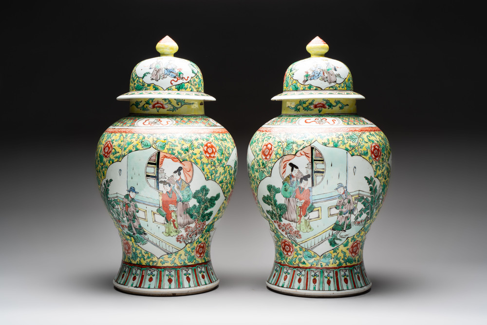 A pair of Chinese famille verte yellow-ground 'Xi Xiang Ji' vases and covers, 19th C.