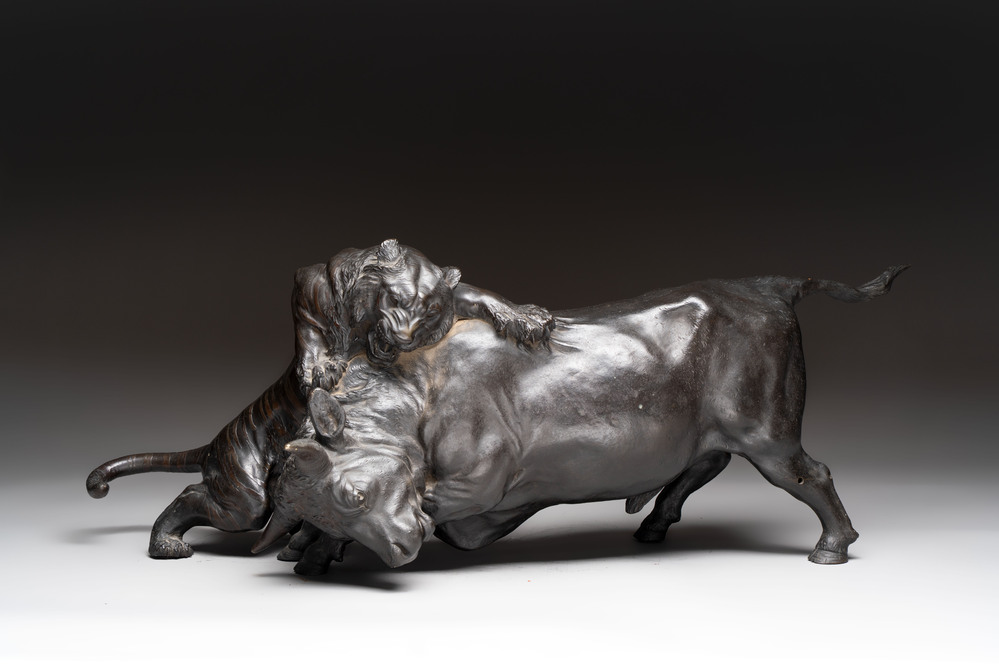 A Japanese bronze okimono of a tiger and a bull, signed Sano Takachika 佐野隆親, Meiji, 19th C.
