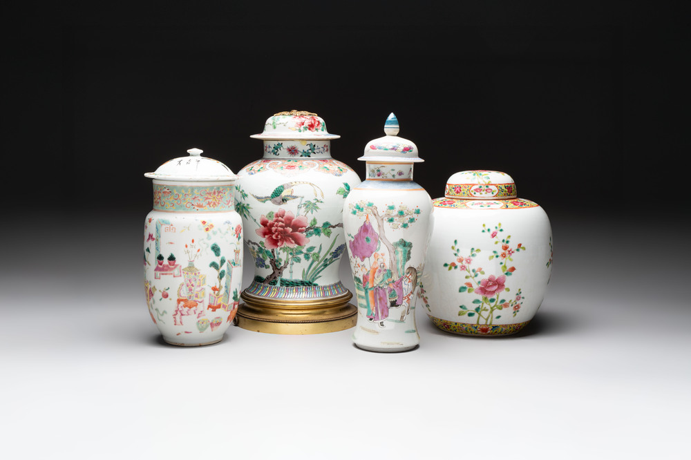 Three Chinese famille rose covered vases, one on a gilt bronze stand, and a covered jar, 19/20th C.