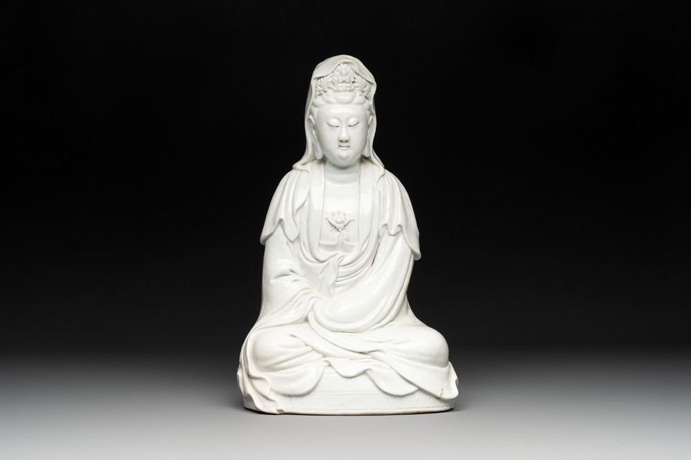 A Chinese white-glazed Guanyin, Kangxi mark, 19th C.
