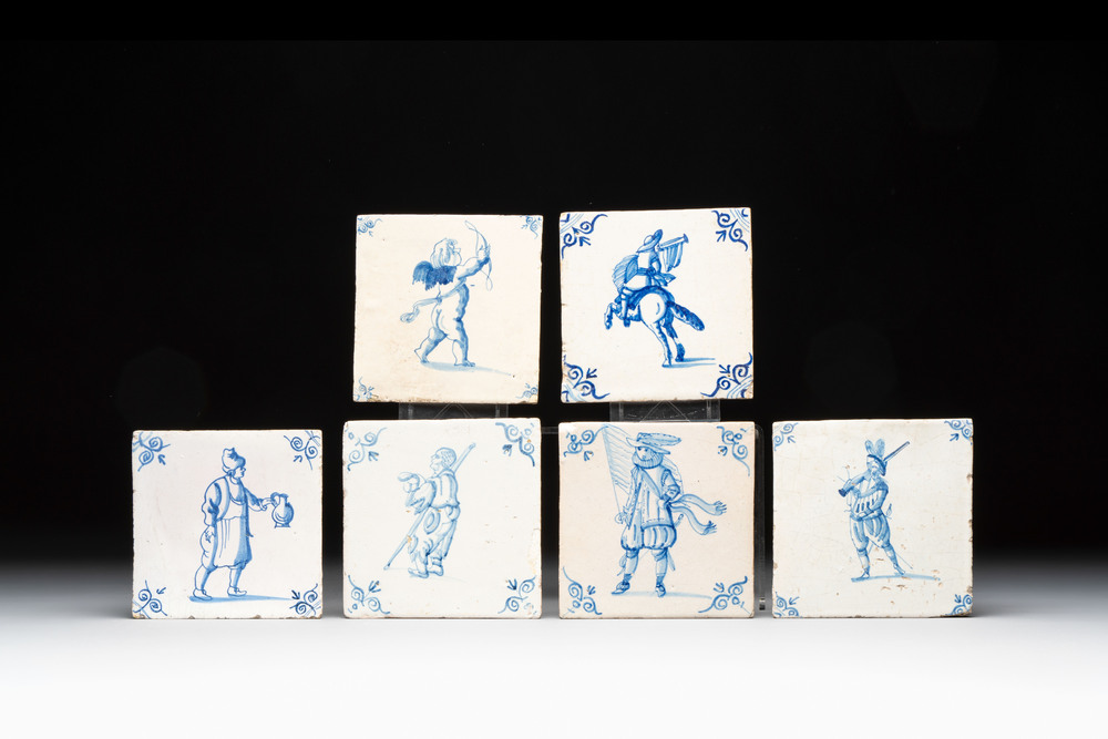 Six blue and white Dutch Delft 'figure' tiles , 17th C.