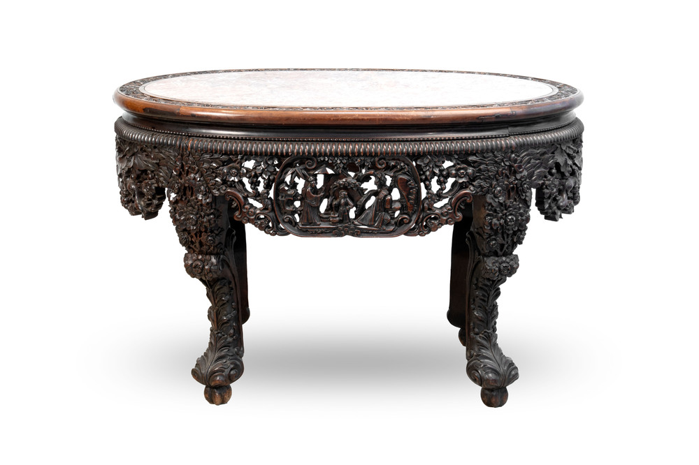 A Chinese finely carved hongmu marble top oval table, Canton, 19th C.