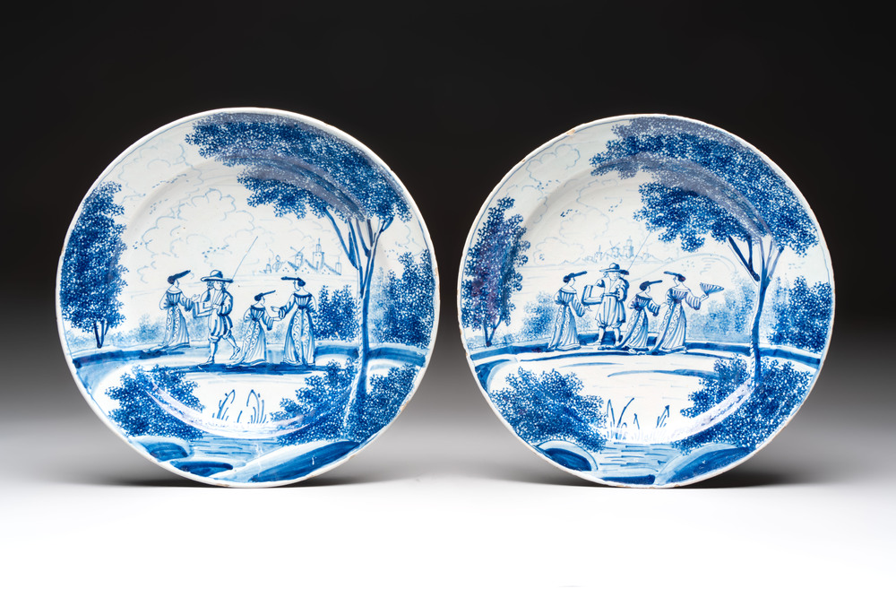 A pair of blue and white Dutch Delft dishes with a pastoral scene, 18th C.