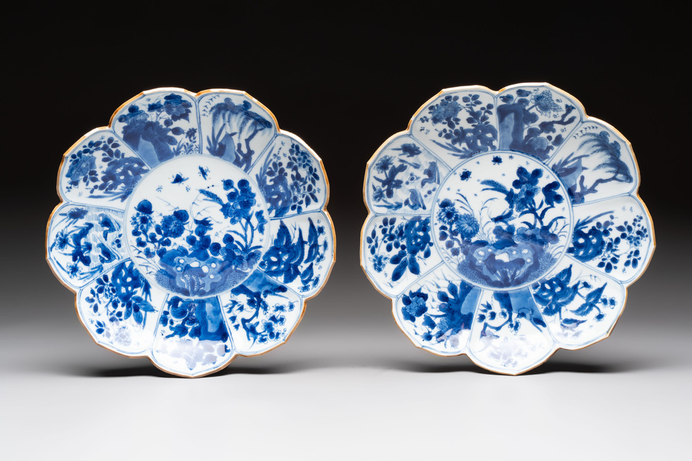 A pair of Chinese blue and white lotus-form 'grasshopper' plates, Kangxi