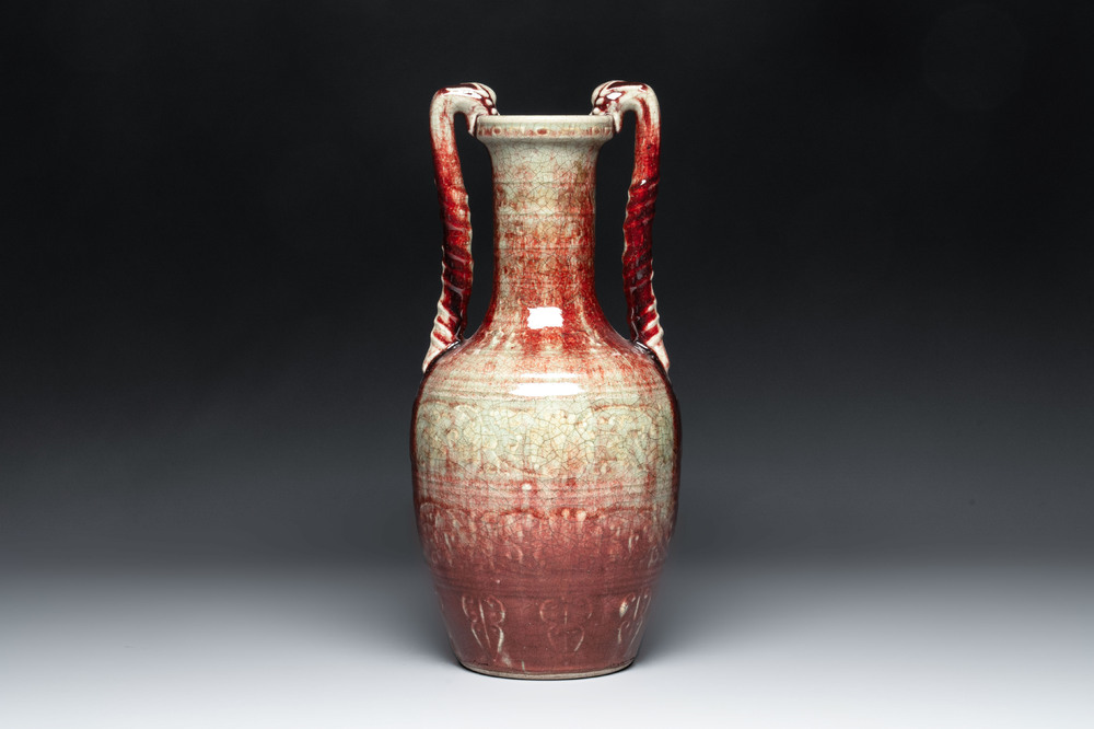 A Chinese peachbloom-glazed vase with dragon-form handles, 18th C.