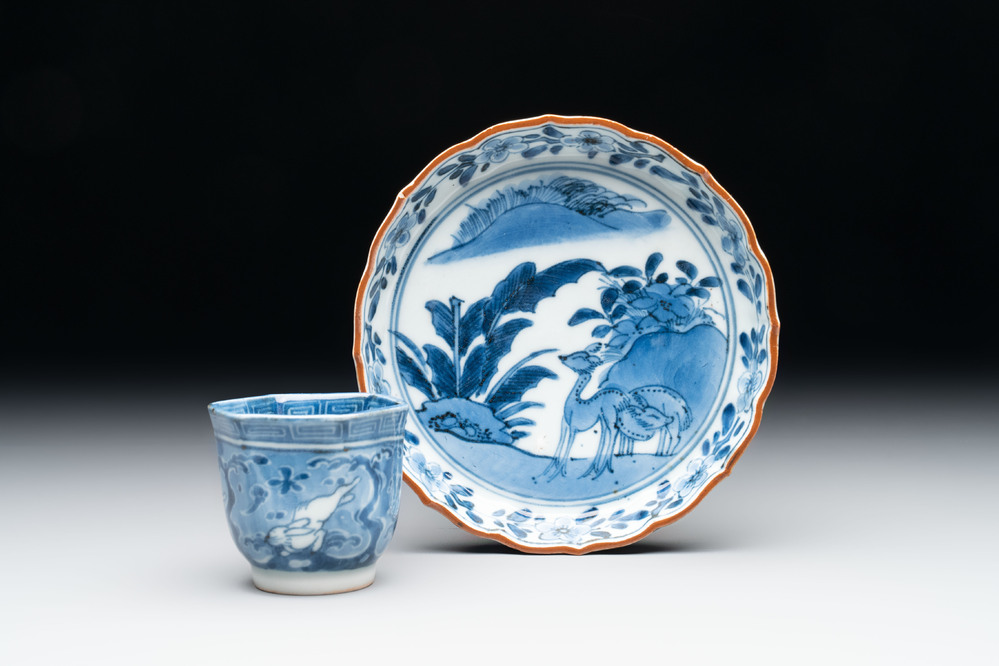A Japanese blue and white 'rabbit' cup and a 'deer' plate, Edo, 17th C.