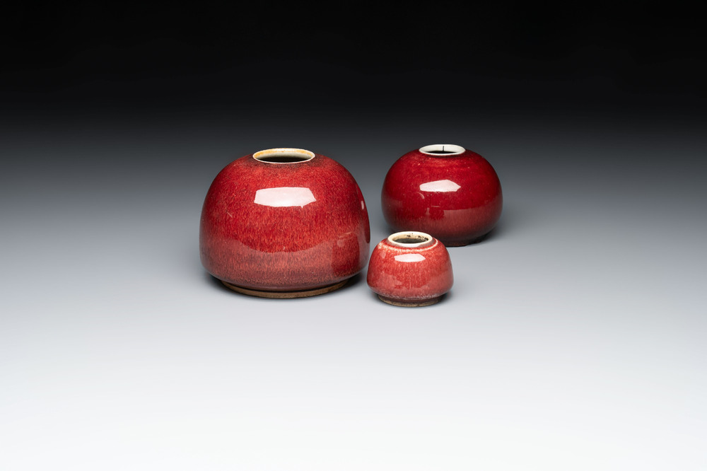 Three Chinese copper-red-glazed water pots, Kangxi mark, 19th C.