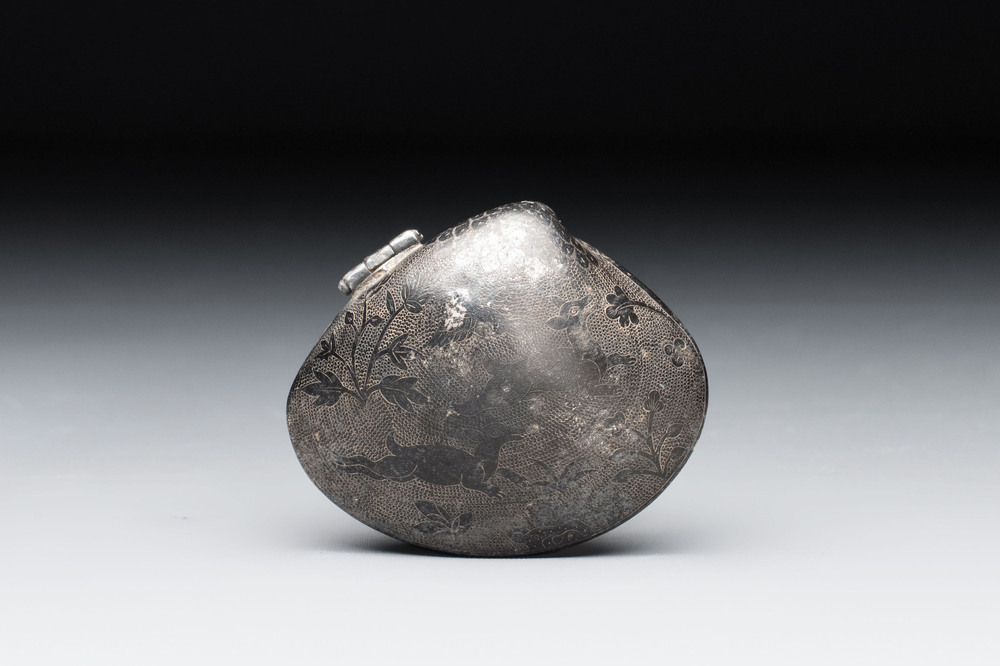 A small Chinese silver clam-shaped box with animals design, Tang/Song