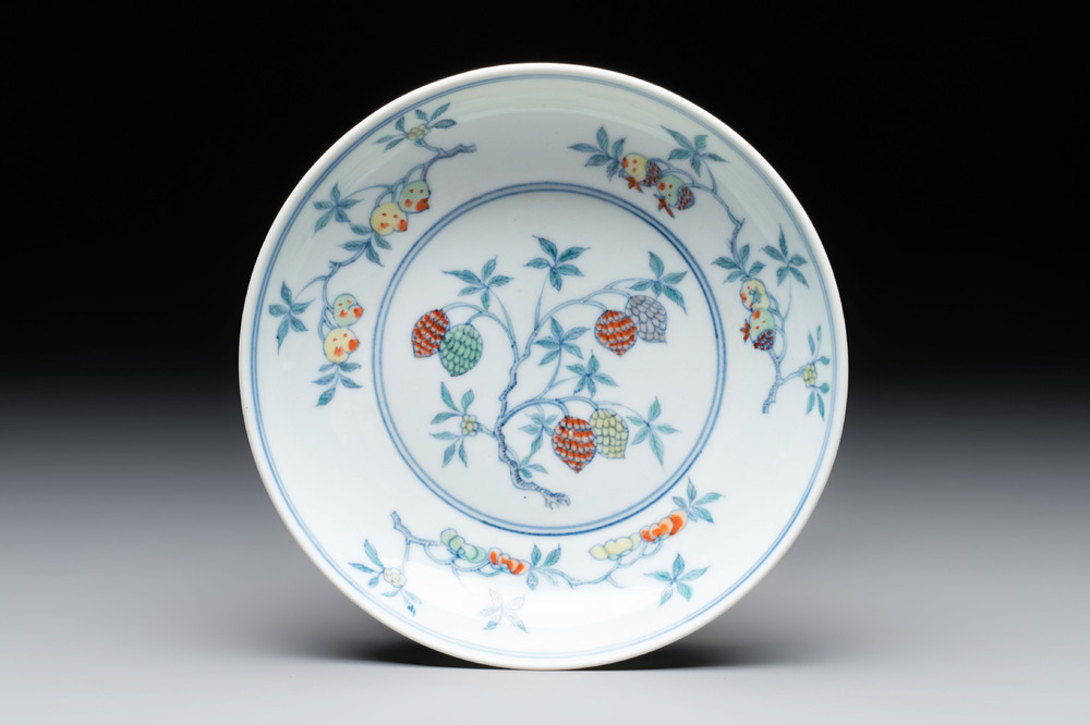A Chinese doucai 'sanduo' plate,  ingot, brush and ruyi mark, Kangxi/Yongzheng