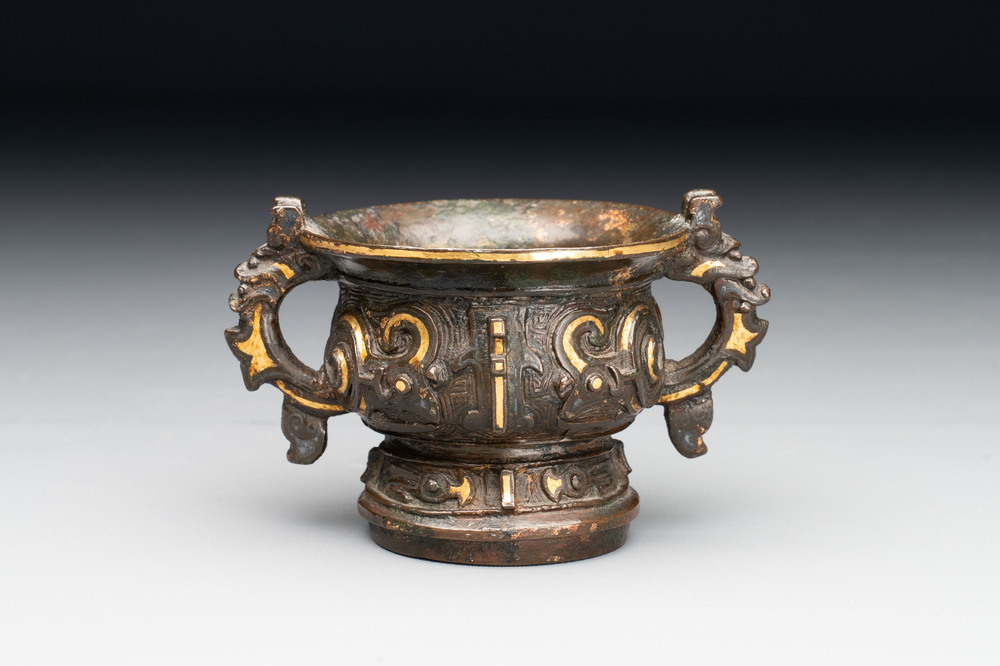 A Chinese archaistic gold and silver-inlaid bronze miniature censer, Ming