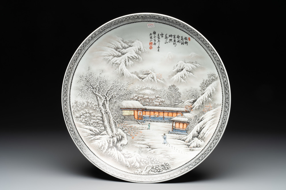 A large Chinese 'winter landscape' dish in the style of He Xuren 何許人, signed Rao Yongchang 饒永昌, dated 1902