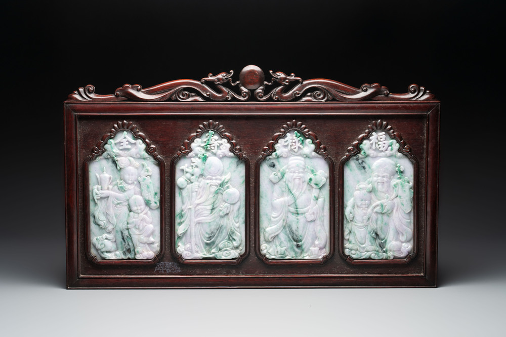 Four Chinese lavender and green jadeite 'Fu Lu Shou Quan 福祿壽全' plaques mounted in a hongmu frame, 19th/20th C.