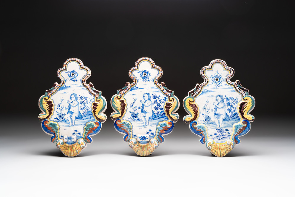 Three polychrome Dutch Delft wall sconces, 19th C.