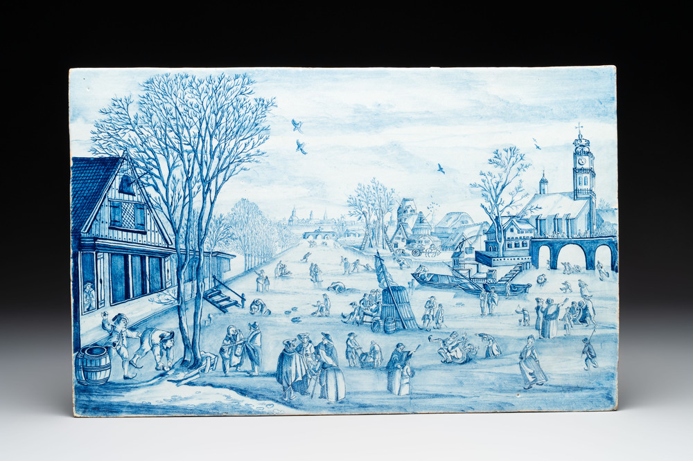 A fine large blue and white Dutch Delft plaque with an ice-skating scene, early 18th C.