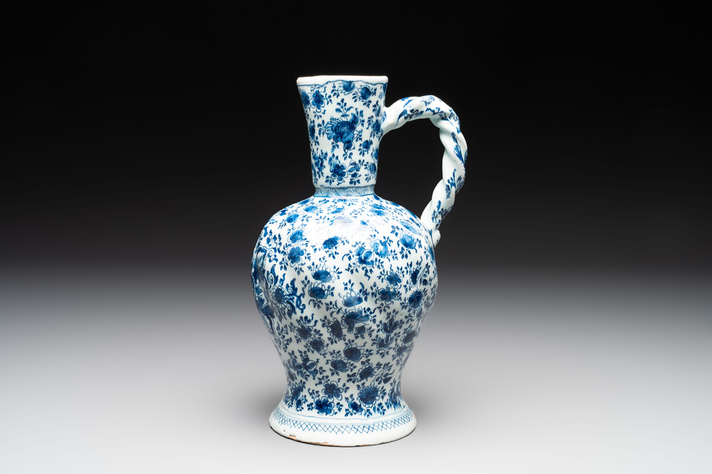 A fine blue and white Dutch Delft ewer with twisted rope handle, ca. 1700