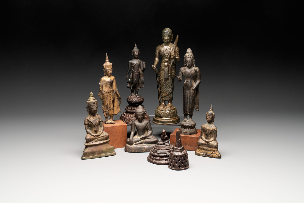 A varied collection of eight bronze Buddha figures, South Asia, 18/19th C.