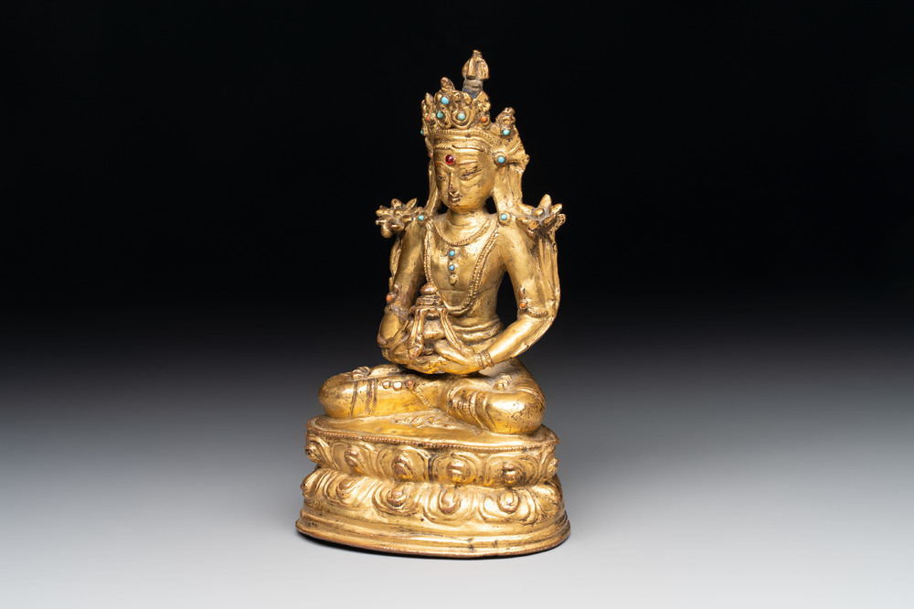 A Sino-Tibetan coral and turquoise-inlaid gilt-bronze Buddha Amitayus, 18th C.