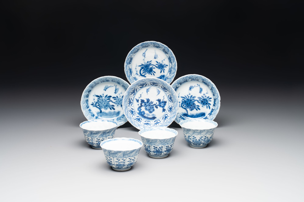 A set of four Chinese blue and white cups and saucers, flower mark, 19th C.