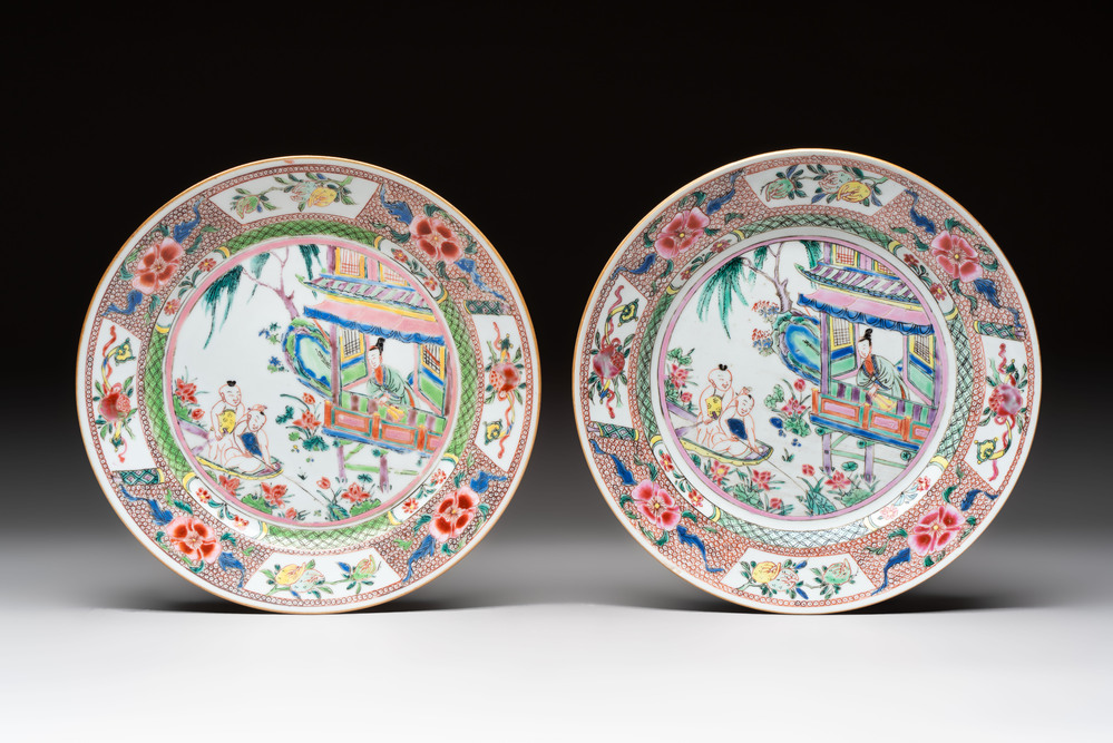 A pair of Chinese famille rose plates with a lady and boys in a boat, Yongzheng/Qianlong