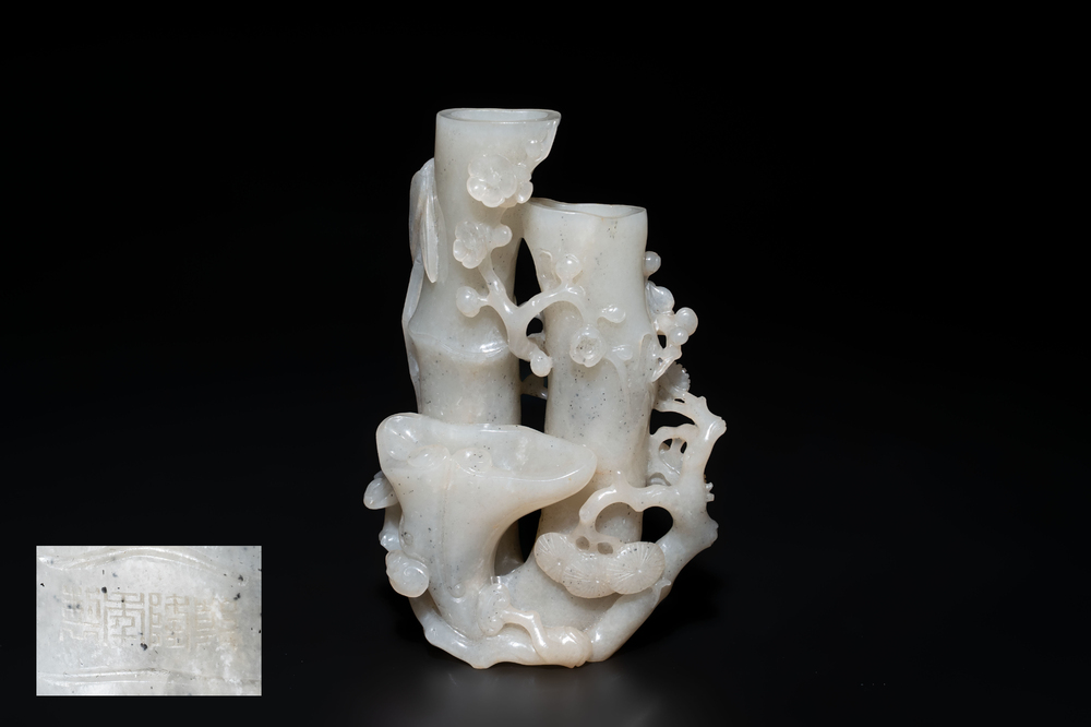 An extremely fine Chinese jade 'Three Friends of Winter' brush holder, Qianlong mark and of the period