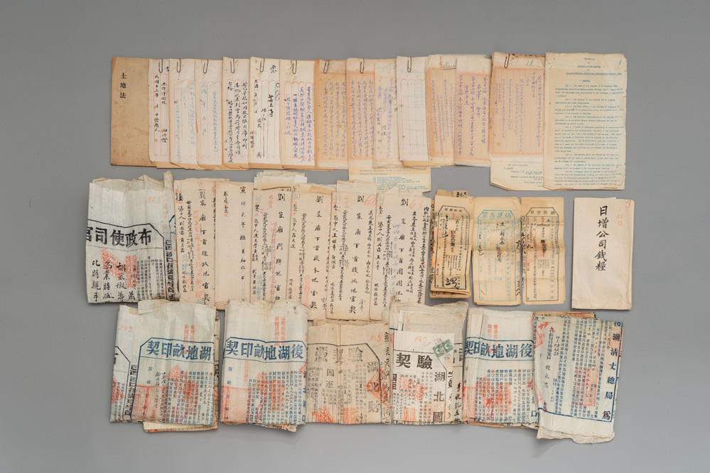 A large collection of 14 Chinese title deeds, 11 share applications, and a land law manual, 19/20th C.