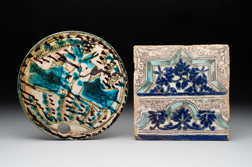 A polychrome Qajar beehive-cover and a tile with floral design, Iran, 18th C.