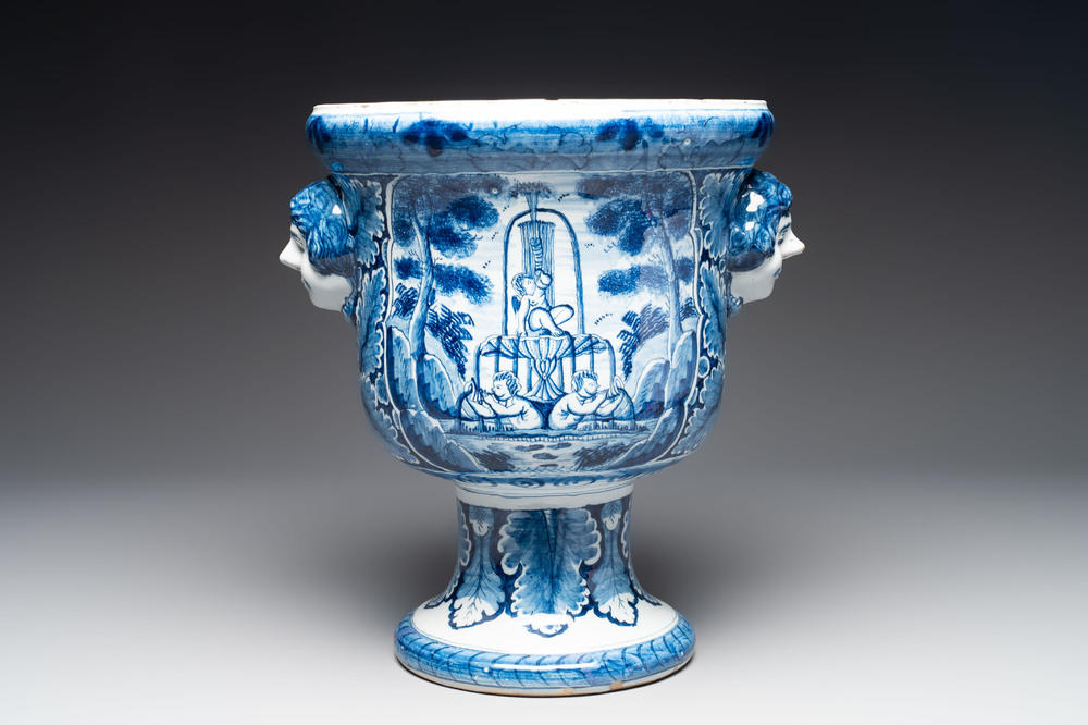 A large blue and white Dutch Delft garden vase with a putti fountain and Venus courting Adonis, 18th C.