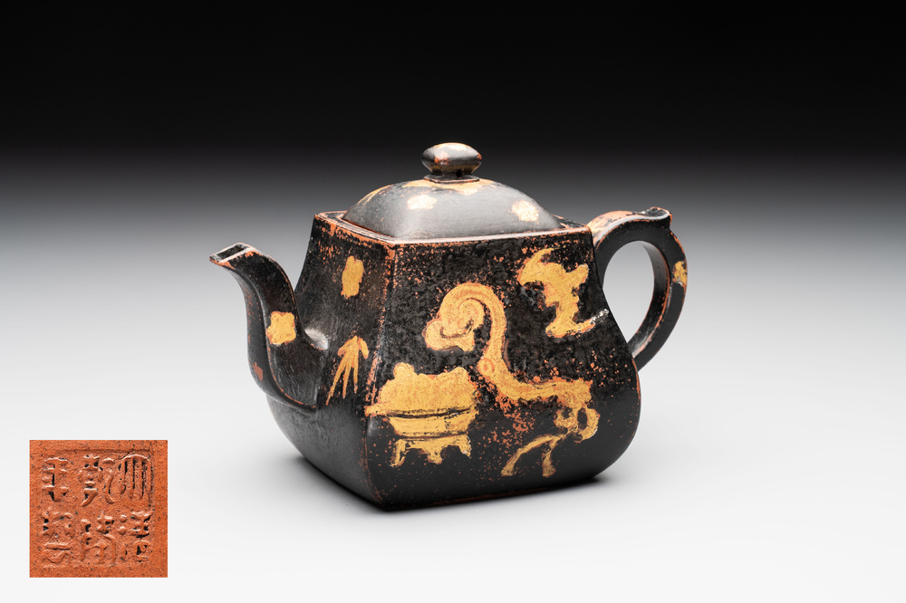 A Chinese gilt and black-lacquered Yixing teapot and cover, Qianlong mark and of the period