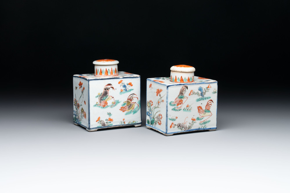 A pair of Chinese famille verte rectangular tea caddies and covers with fighting roosters, Kangxi