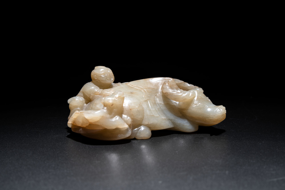 A Chinese jade 'boy on a buffalo' group, Qing