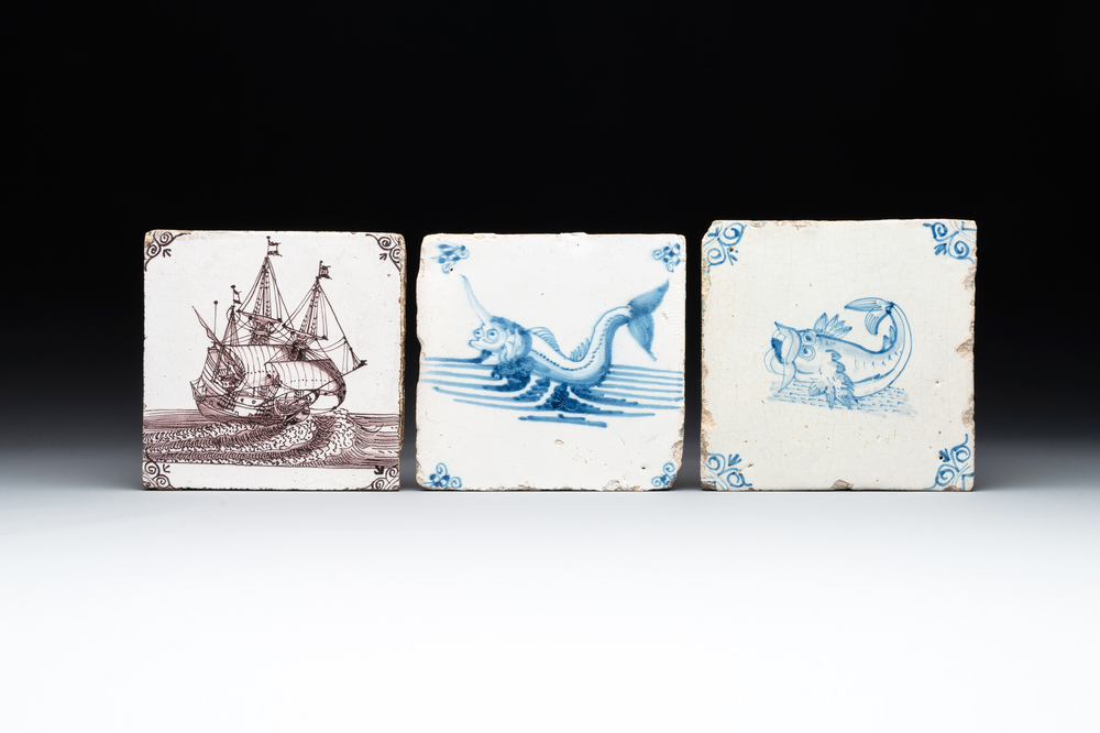 Two blue and white Dutch Delft 'sea monster' tiles and a manganese 'ship' tile, 17/18th C.