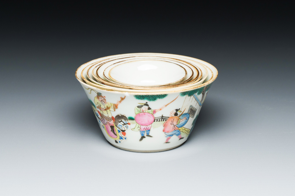 A set of seven Chinese famille rose nesting bowls with narrative design, Daoguang